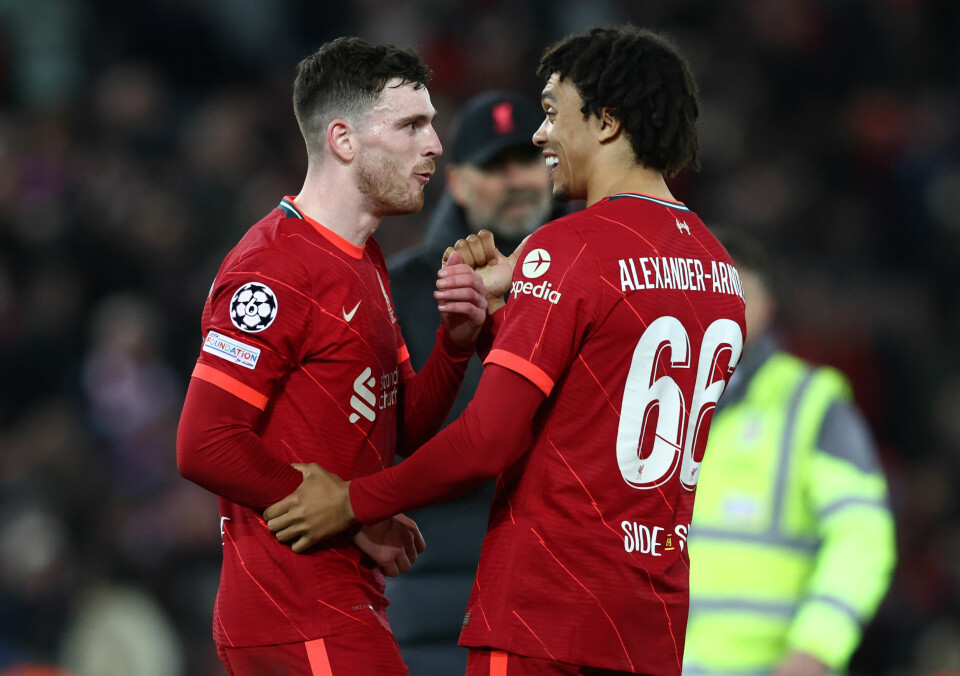 Liverpool, England, 27th April 2022.   Andrew Robertson of Liverpool and Trent Alexander-Arnold of Liverpool enjoy the win during the UEFA Champions League match at Anfield, Liverpool. Picture credit should read: Darren Staples / Sportimage via PA Images